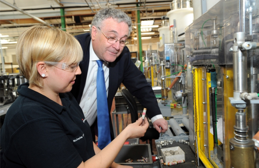 David Parsons meets with press operator Michelle Glenn during his factory tour