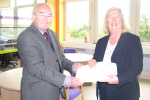 Ivan Ould CC hands Lesley Pendleton the 1,000 name petition